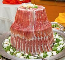 Raw ham arranged like a fountain. photo