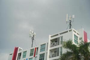 A building with a cell phone tower on top of it photo