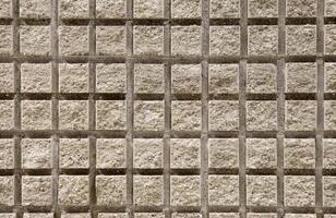 Squared wall made of cement texture photo