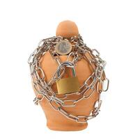 Piggy bank with lock and chain photo