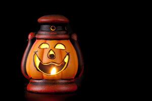 Pumpkin lantern with candle photo