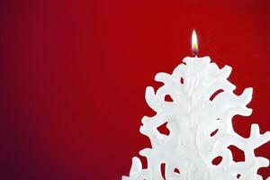 Christmas candle shaped like a Christmas tree photo