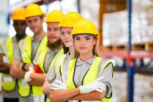Group of workers standing in a warehouse photo
