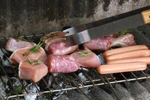 Barbecue grill with chicken and meat photo