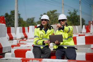 Two men in hard hats photo
