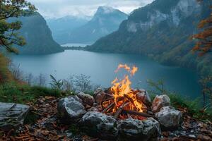 Tranquil Lakeside Campfire with Mountain View for Outdoor Adventure and Relaxation photo