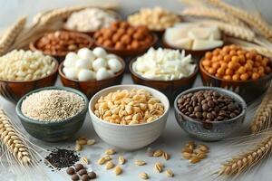 Assorted Grains and Pulses in Bowls Surrounded by Wheat for Culinary Inspiration and Nutrition photo