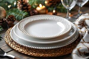 Elegant Holiday Dinner Setting with White Plates and Festive Decor photo