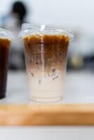 Cup of ice cafe latte with two layer, espresso and fresh milk photo