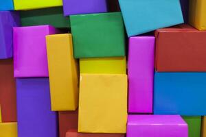 A pile of colorful boxes stacked on top of each other photo