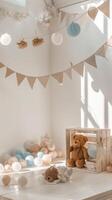 A room with a table, a teddy bear and bunting photo
