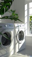 a modern white laundry room interior featuring a washing machine and dryer, with a window positioned on the left side. photo
