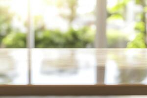 Blurred background with a wooden surface in sunlight. photo