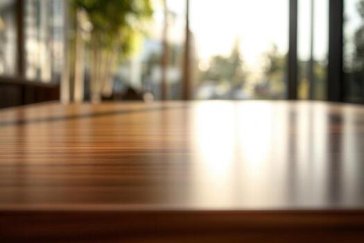Blurred wooden table in a bright, modern setting. photo