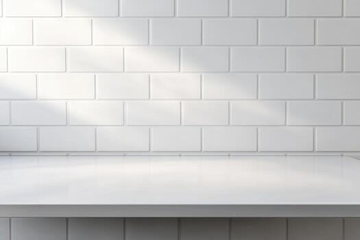 Clean white tiled wall with a glossy countertop. photo