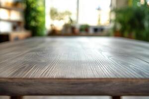 Close-up of a wooden table in a bright, green space. photo