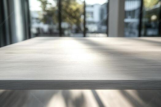 Close-up of a wooden table surface in a modern setting. photo
