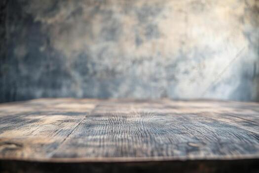 A textured wooden surface with a blurred background. photo