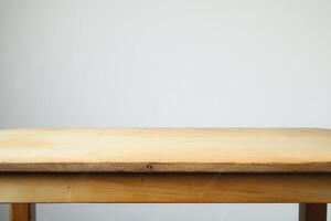 A simple wooden tabletop against a plain background. photo