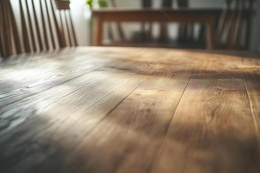 Close-up of a wooden table in a cozy interior setting. photo