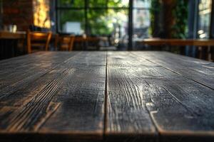 Close-up of a rustic wooden table in a cozy cafe. photo