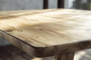 Close-up of a wooden table surface highlighting grain patterns. photo