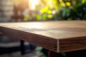 Close-up of a wooden table with a blurred green background. photo