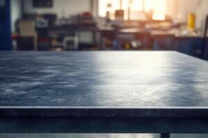 Industrial workspace with a focus on a smooth table surface. photo