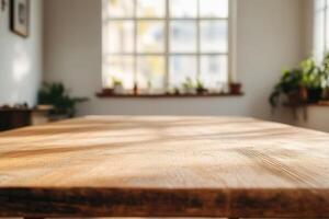 Sunlit wooden table with plants and window view. photo