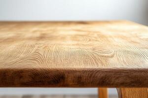 Close-up of a wooden table surface showcasing texture. photo