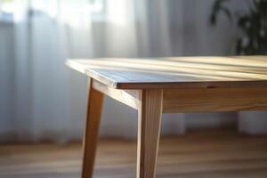 Wooden table with soft lighting in a cozy interior. photo