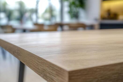 Close-up of a wooden tabletop in a modern setting. photo