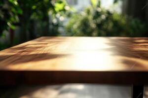 Wooden table illuminated by soft sunlight and greenery. photo