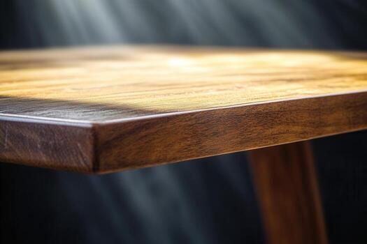 Close-up of a wooden table surface with light reflections. photo