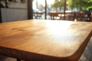 Wooden table in a cozy cafe setting. photo