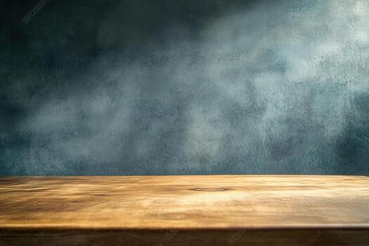 Wooden table against a textured backdrop. photo