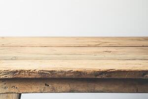Wooden table surface with a rustic finish. photo