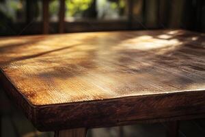 Close-up of a wooden table with natural light reflections. photo