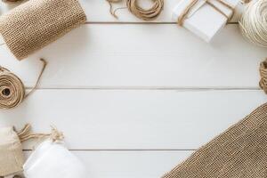 Rustic crafting materials arranged on a wooden surface. photo