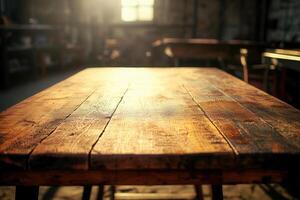 Rustic wooden table in a sunlit workshop setting. photo