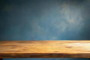 Wooden table against a textured blue background. photo