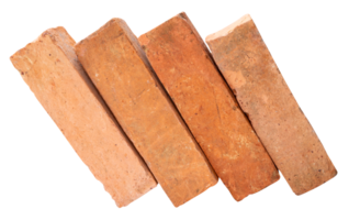 Side view of red or orange bricks in pile isolated with clipping path in file format png