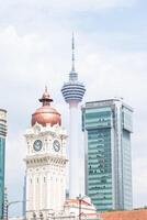 A large building with a clock tower photo