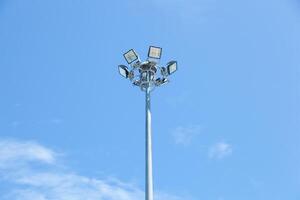 A street light with four lights on top photo