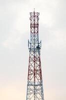 A tower with a red and white tower photo