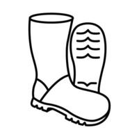 a black and white drawing of a pair of boots vector