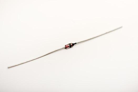 A radio element on a white background. A zener diode. photo