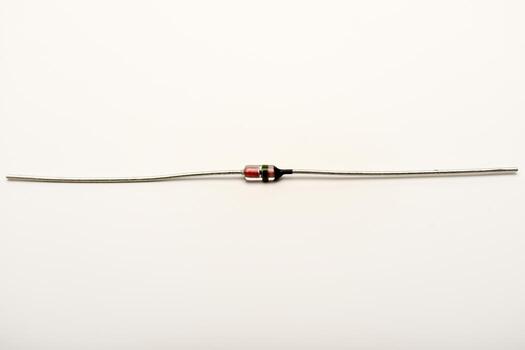 A radio element on a white background. A zener diode. photo