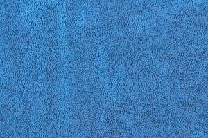 Blue color abstract fabric cloth with short pile fluffy, soft texture vivid background, copy space photo