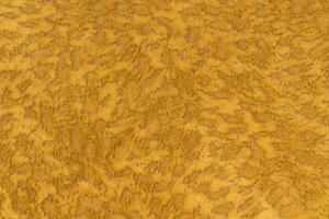 Yellow color velvet or velour with short haired fluffy and soft texture background. Close-up photo